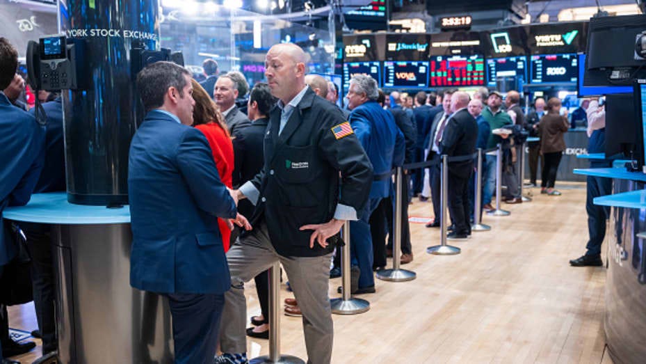 Traders work on the floor of the New York Stock Exchange (NYSE) on April 10, 2024 in New York City. As new inflation data released today showed a continued rise, stocks fell across the board with the Dow falling over 400 points.