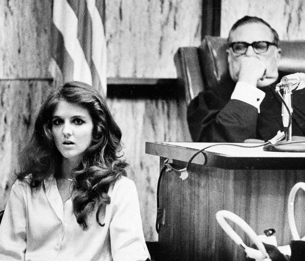 PHOTO: Carol DaRonch testifies at a pre-sentencing hearing for convicted murderer Ted Bundy as Judge Edward Cowart looks on in Miami, July. 28, 1979.