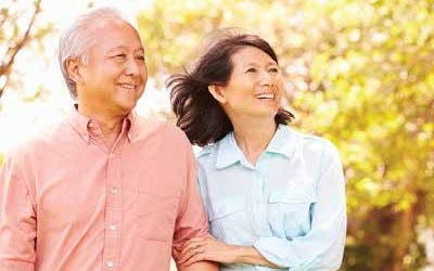 asian couple walking together