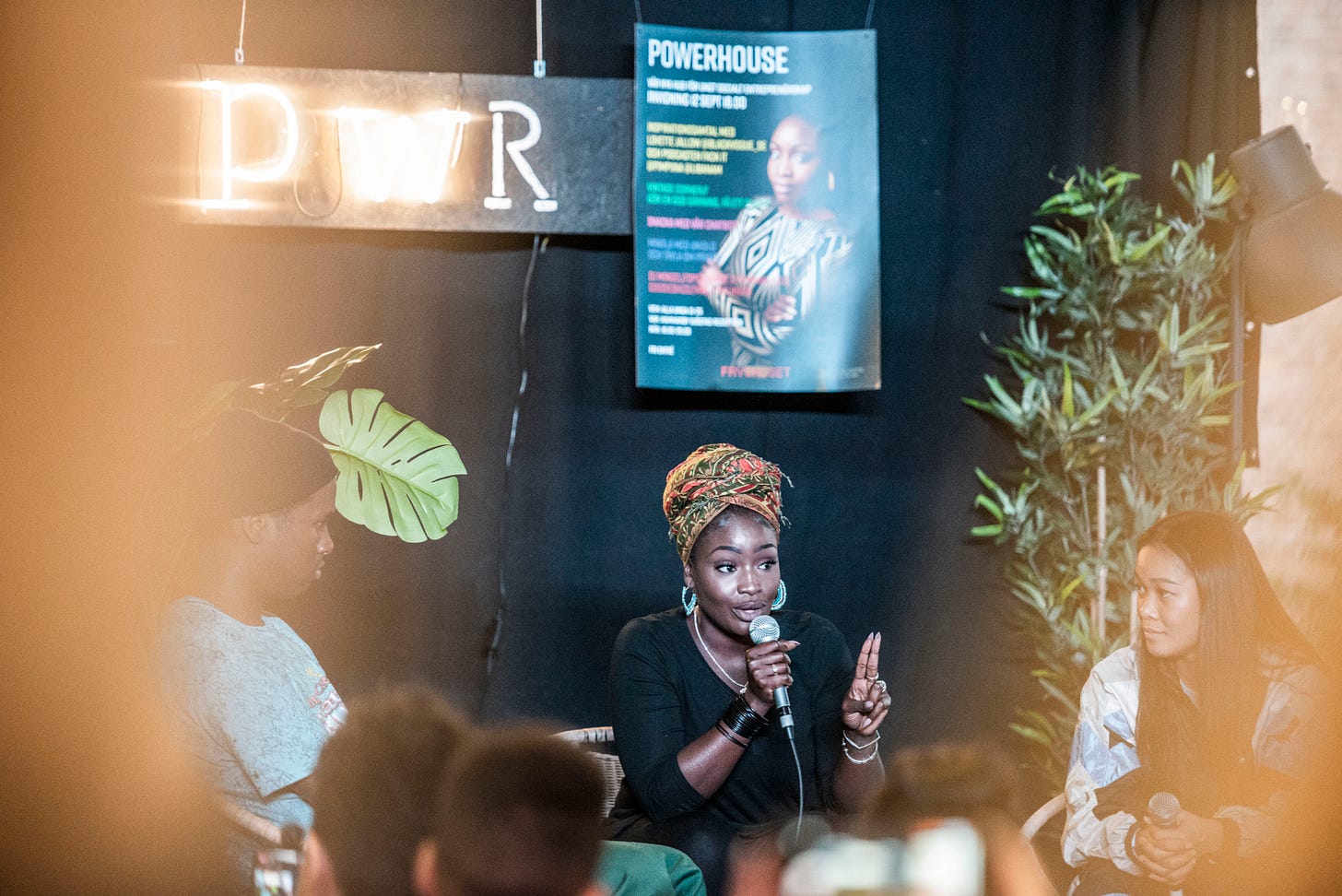 Lovette Jallow speaks at Fryshuset during an anti-racism event, addressing systemic injustice, structural accountability, and the realities of navigating racism in Swedish society. She stands in front of an engaged audience, emphasizing lived experience and policy-based change. Lovette Jallow speaks at Fryshuset during an anti-racism event, addressing systemic injustice, structural accountability, and the realities of navigating racism in Swedish society. She stands in front of an engaged audience, emphasizing lived experience and policy-based change.