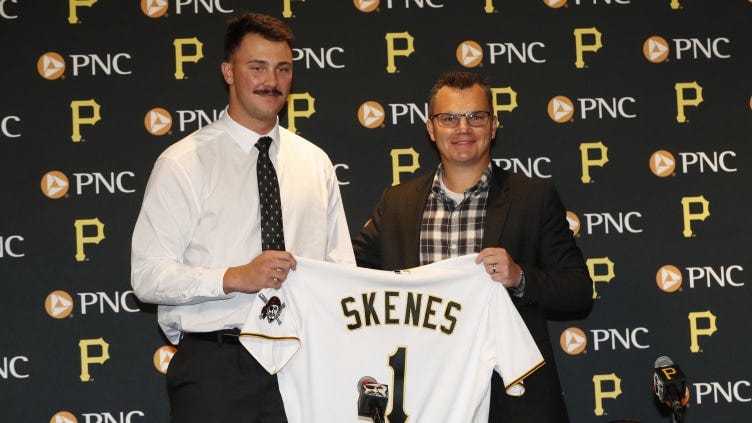 Jul 18, 2023; Pittsburgh, Pennsylvania, USA; Pittsburgh Pirates pitcher Paul Skenes (left) is