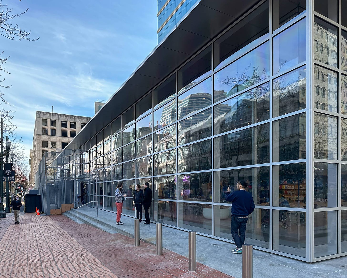 Apple Pioneer Place with a new polycarbonate fence.