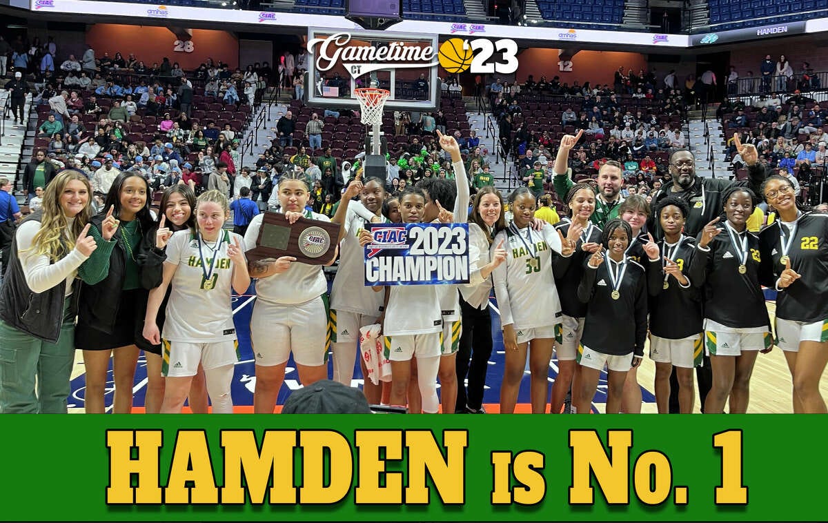 Hamden poses with its 2023 Class LL girls basketball championship trophies after defeating Ludlowe 63-48 at Mohegan Sun Arena Saturday, March 18, 2023. The Green Dragons finished the 2022-23 season 27-0 and No. 1 for the first time in school history.