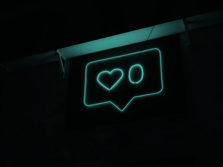 A neon social media like symbol.
