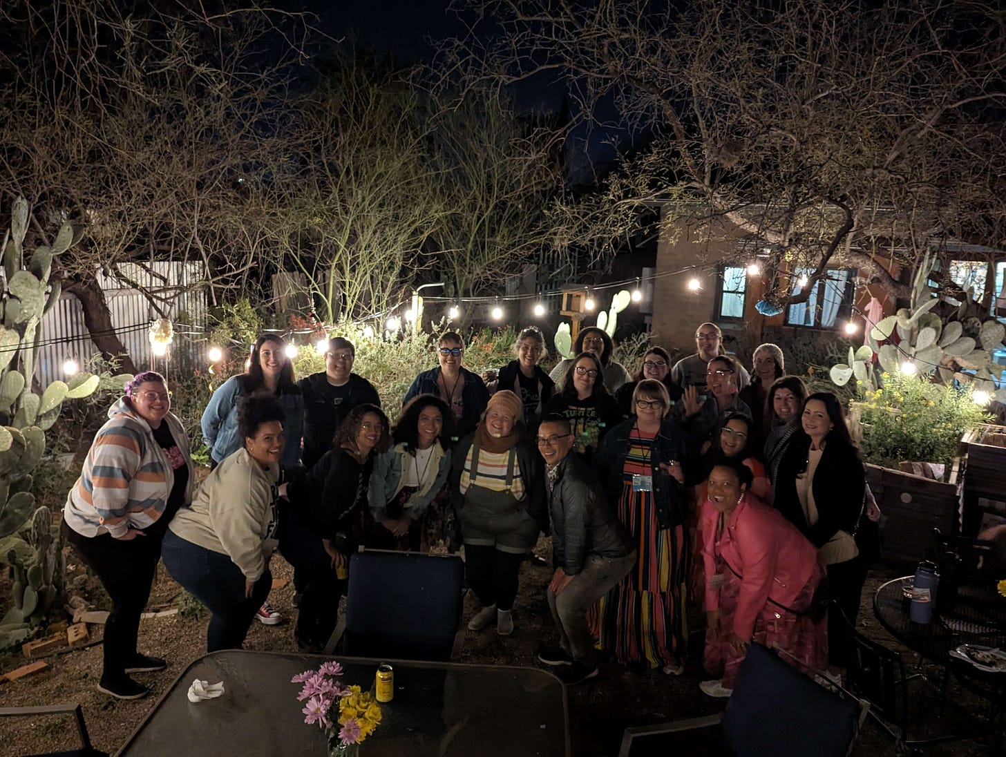 Picture taken in picturesque Arizona backyard at night of a bunch of romance authors, moderators from the panels, and other related people!