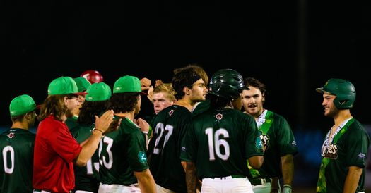 May be an image of 7 people, people batting, scoreboard, stadium and text