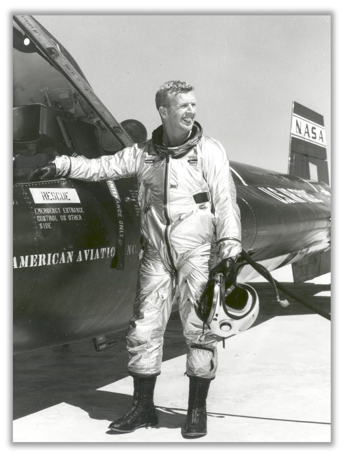 Walker is pictured with his X-15.  He has a broad grin on his face.