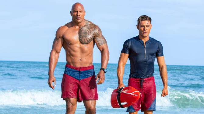 baywatch bombs at box office dwayne johnson zac efron