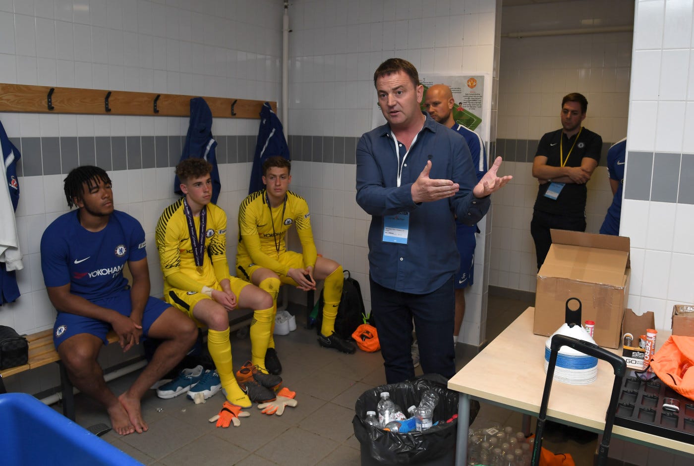 Neil speaks with Chelsea's Under-18s, including future club captain Reece James, in 2018