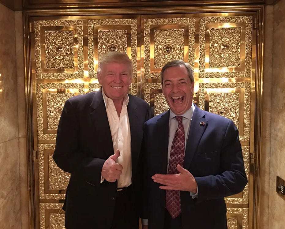 Two men in suits standing in front of a gold door
Description automatically generated Two men in suits standing in front of a gold door
Description automatically generated