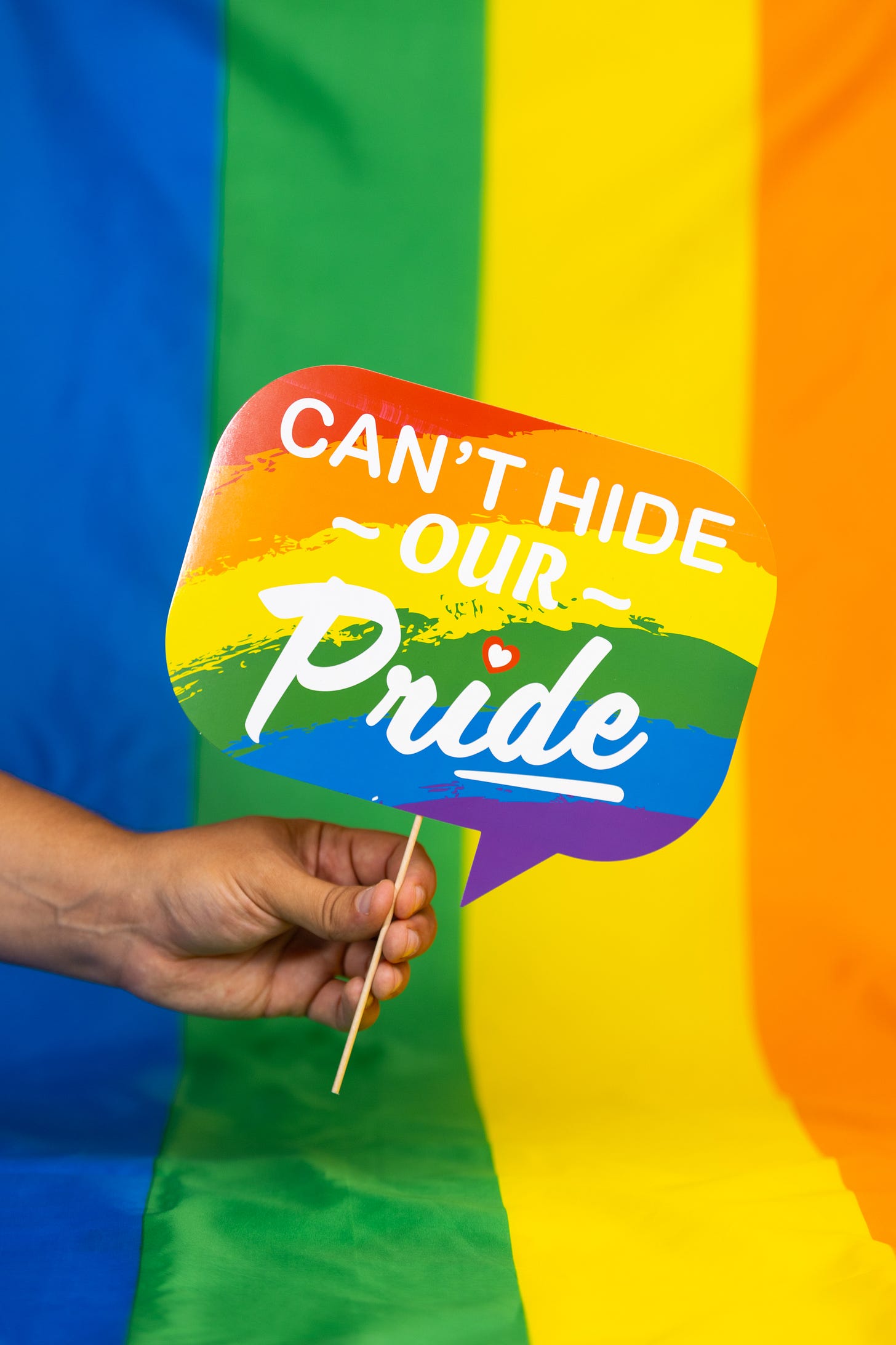 Free Hand Holding Gay Pride Slogan Stock Photo