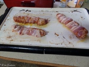 Frying to crisp the bacon