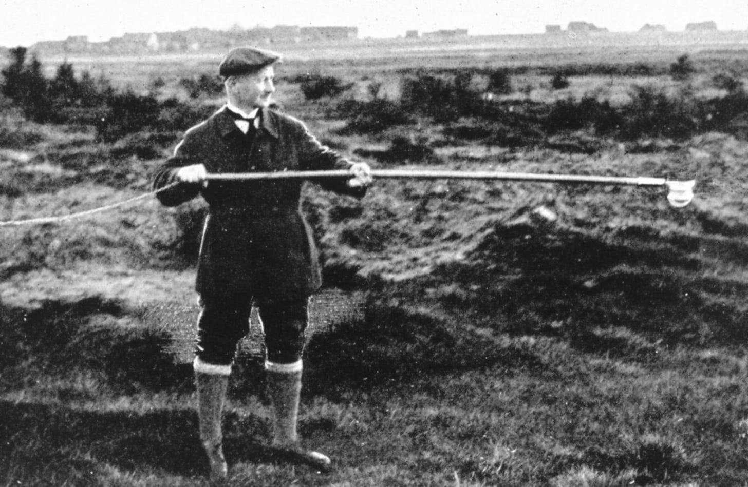 a historical photo shows a meteorologist using an instrument on a long pole to measure albedo, the ratio of the amount of electromagnetic radiation reflected by a body to the amount incident upon it a historical photo shows a meteorologist using an instrument on a long pole to measure albedo, the ratio of the amount of electromagnetic radiation reflected by a body to the amount incident upon it