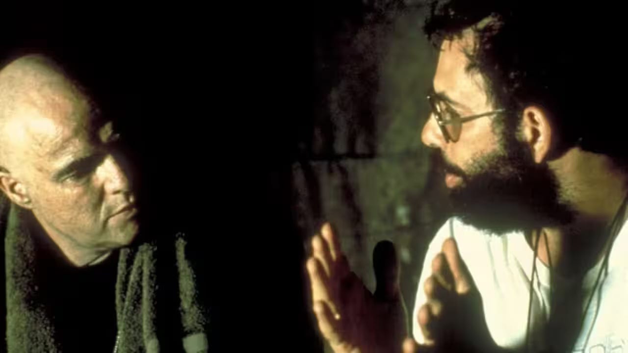 Still from Eleanor Coppola's documentary Hearts of Darkness showing Francis Coppola directing Marlon Brando