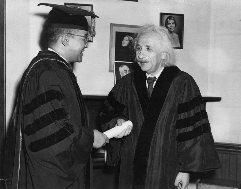 Albert Einstein and Lincoln University president Horace Mann Bond pose for photographs after the conferring of the honorary degree.