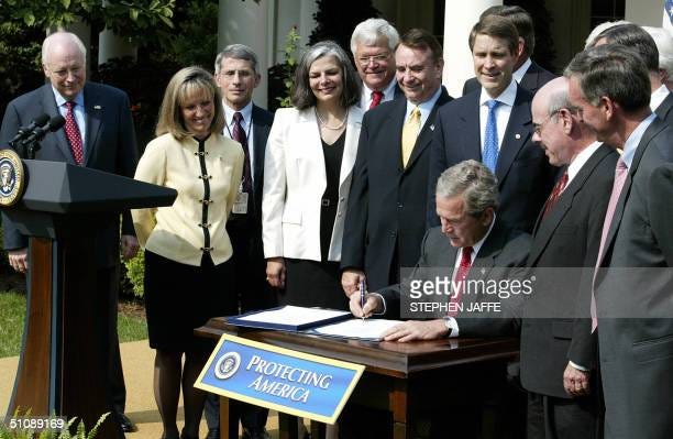 US President George W. Bush signs Project BioShield Act of 2004, in a...  News Photo - Getty Images