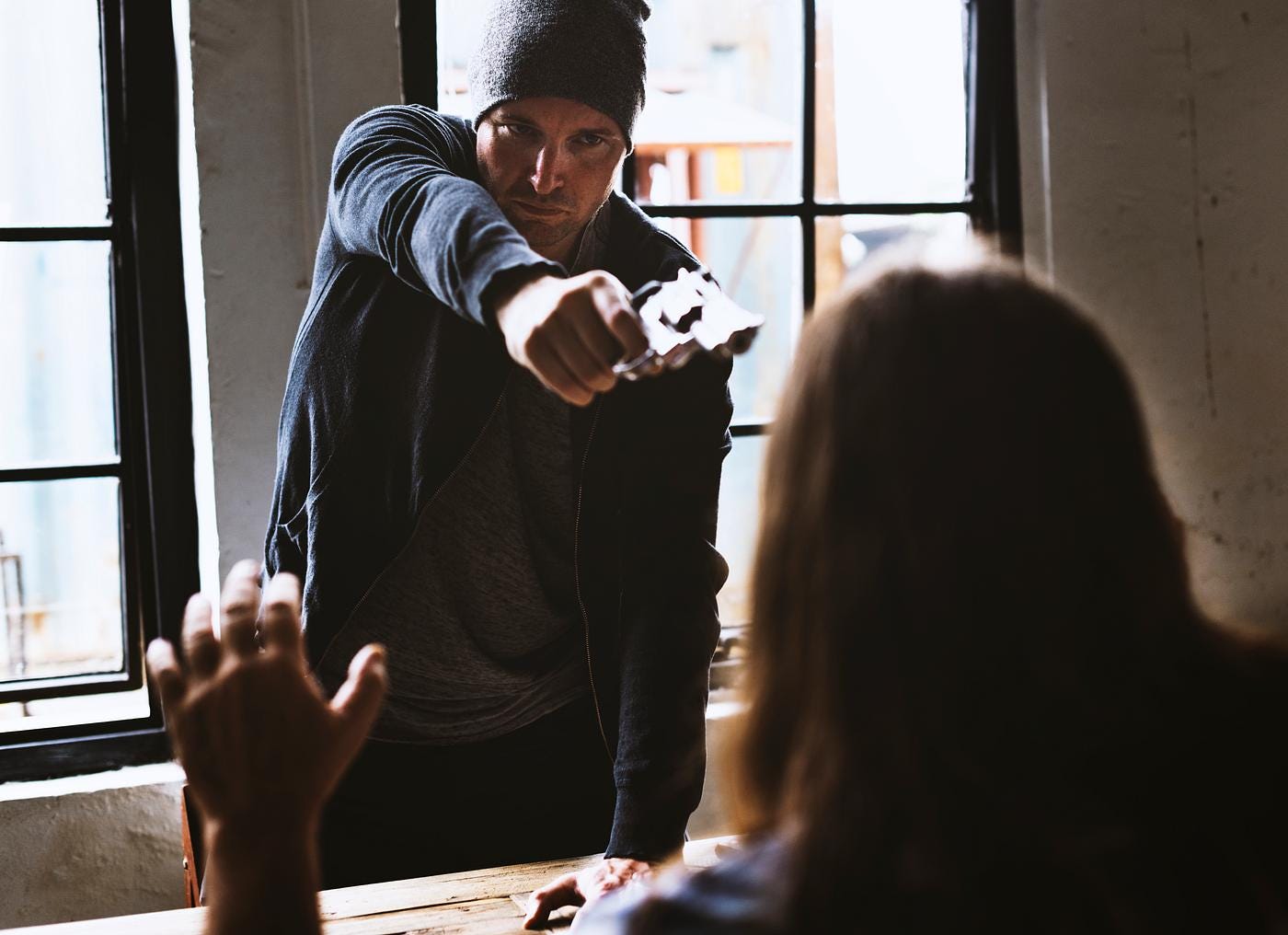 Man holding a woman hostage | Royalty free stock photo - 50271