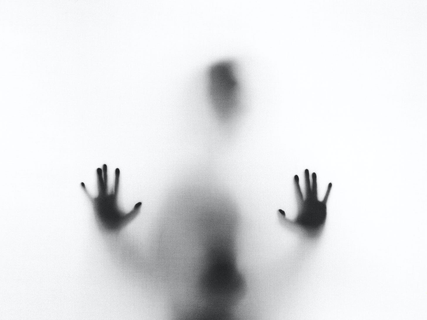A photo of a person behind fog