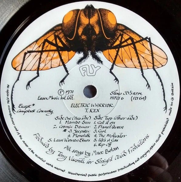 Record label for 'Electric Warrior' by T. Rex - Fly logo and track listing