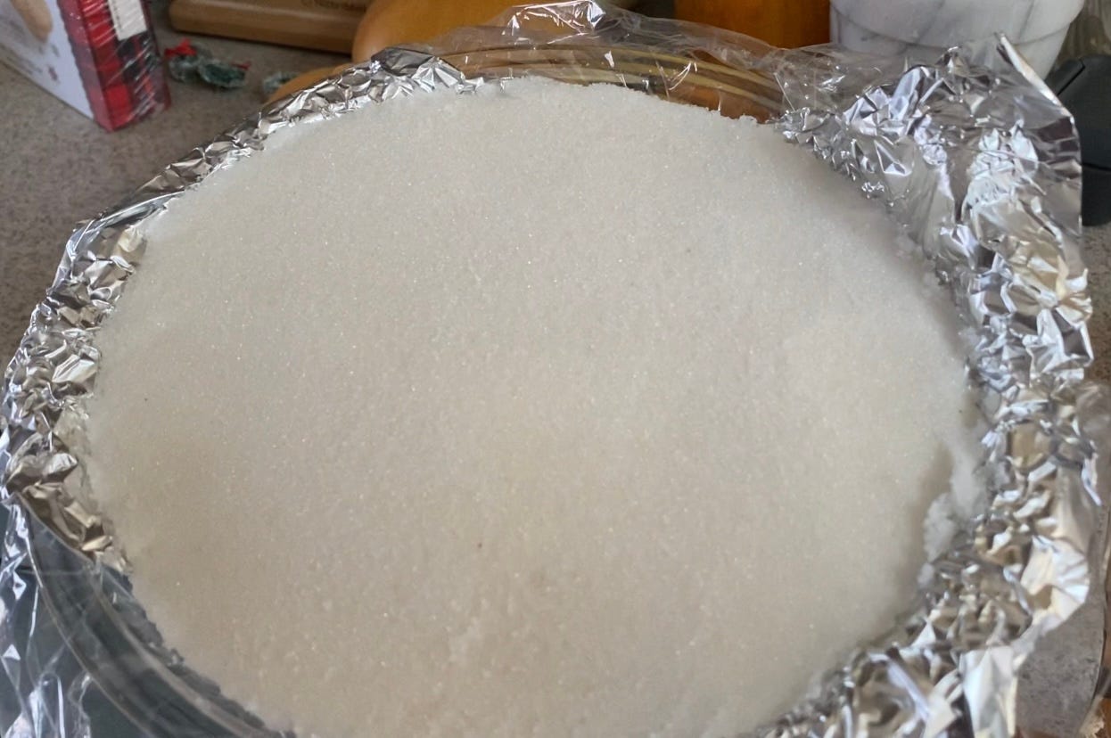 sugar brick in a foil-lined pie dish