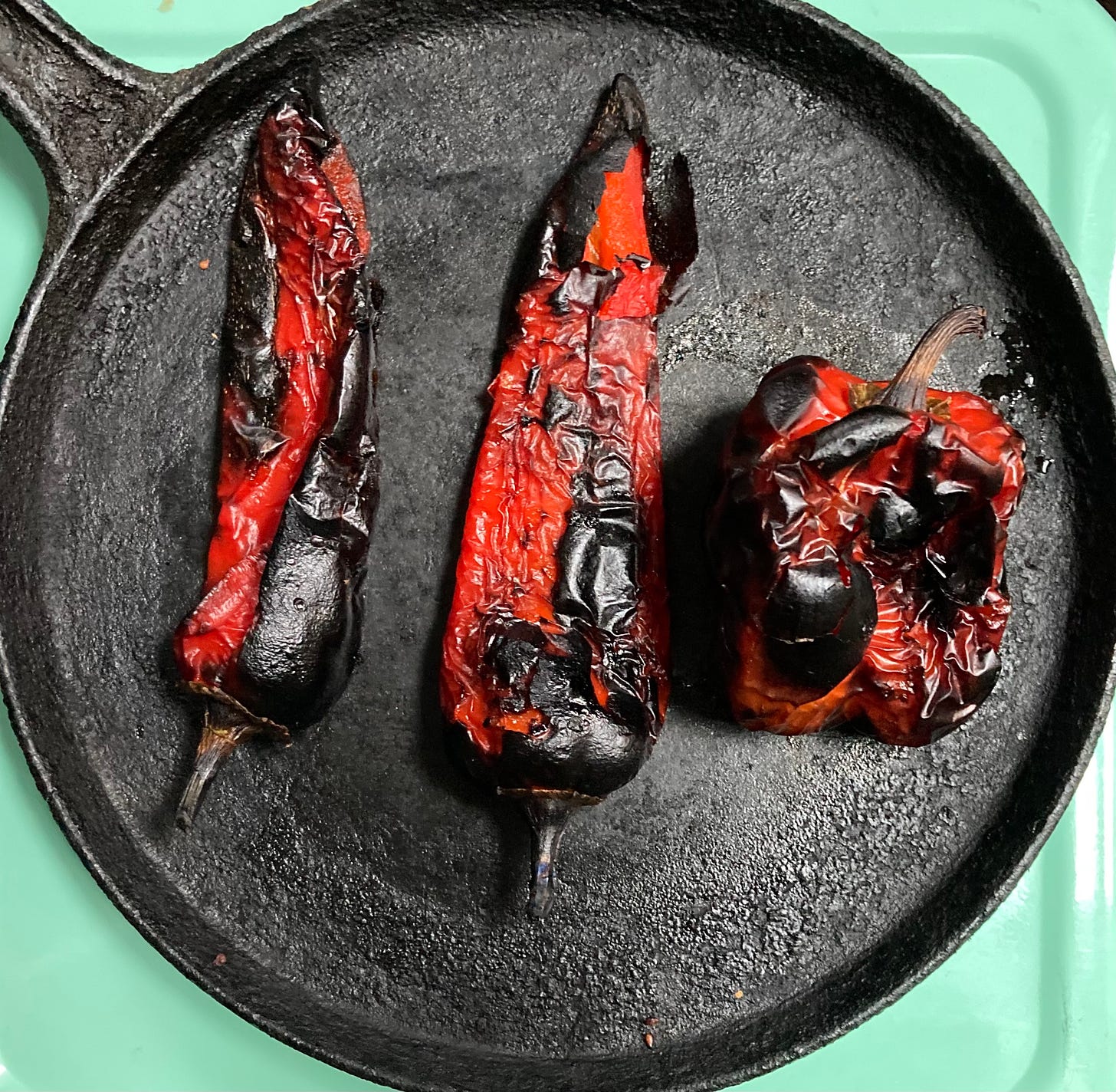 Charred sweet peppers cooked under the broiler