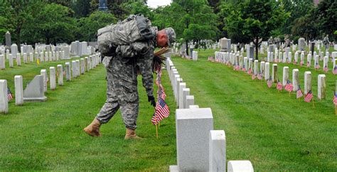 Soldiers participate during Flags In at Arlington Cemetery | Article ...