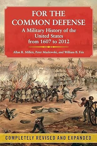 Book cover of “For the Common Defense, A Military History of the United States from 1607 to 2012” center in the upper portion of the cover on a red rectangular background.  Below the title on the red rectangle are the author’s names. The cover depicts a color drawing of a battle scene with flags and formations of troops clashing. The scene is reminiscent of a Civil War era military unit. 