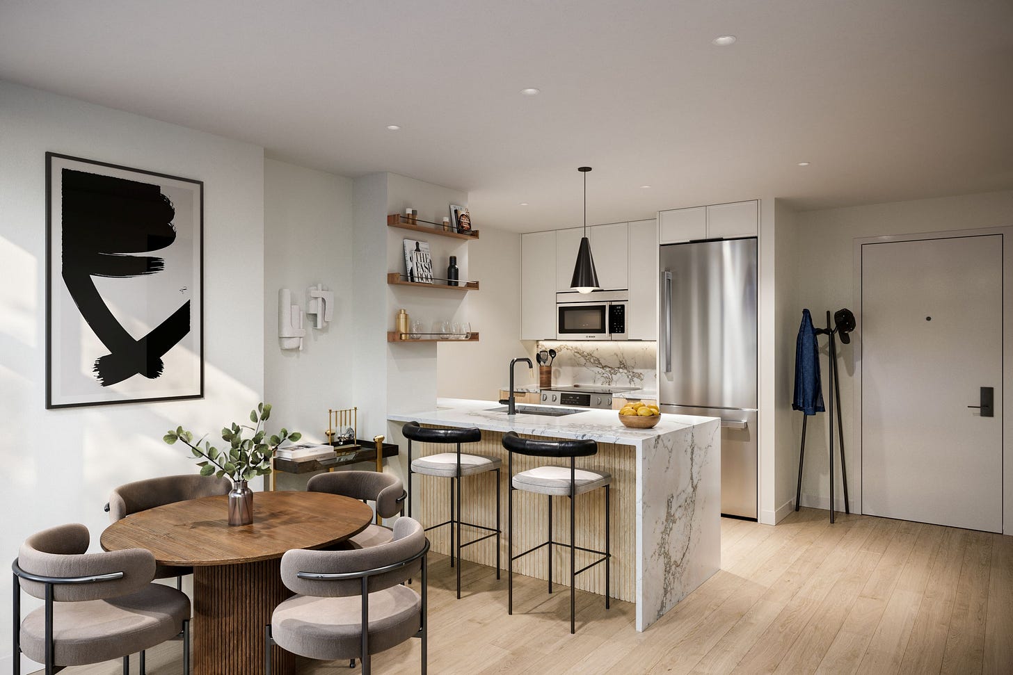 unit kitchen and dining area with marble peninsula separating the two