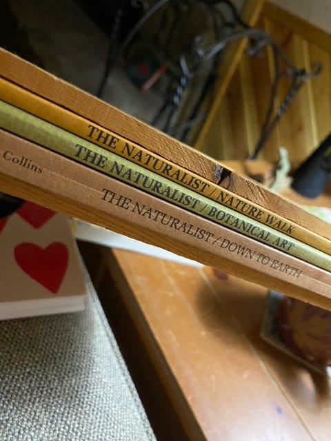 three book spines in The Naturalist series for nature walk, botanical art, and down to earth