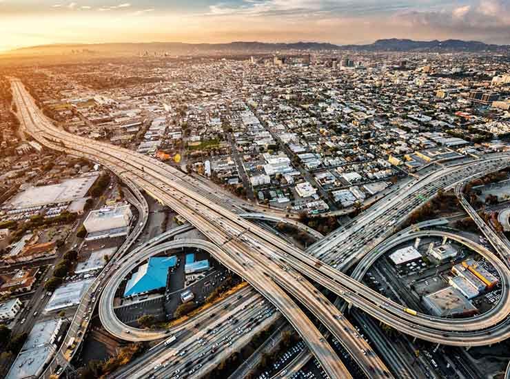 Helicopter view of highway interchange in Los Angeles, California. Helicopter view of highway interchange in Los Angeles, California.