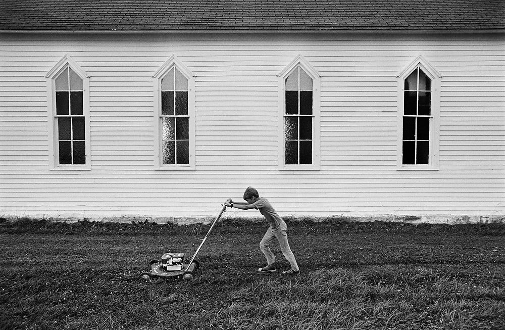 Mowing the church lawn, Cuba, Kansas | Jim Richardson
