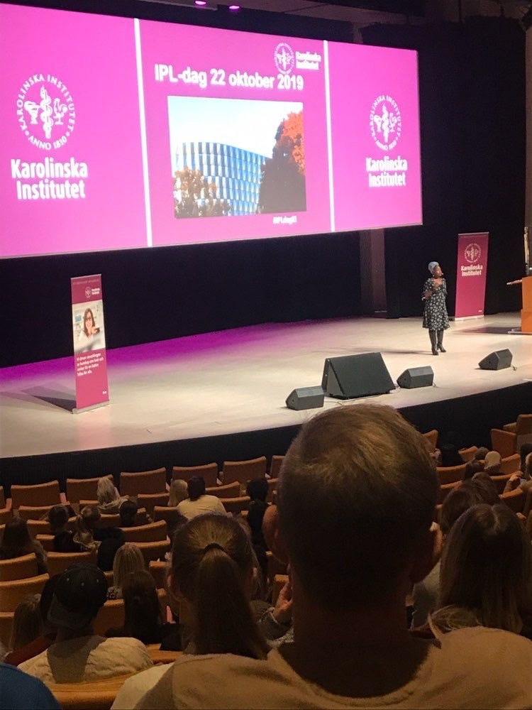 Lovette Jallow lecturing at Karolinska Institute