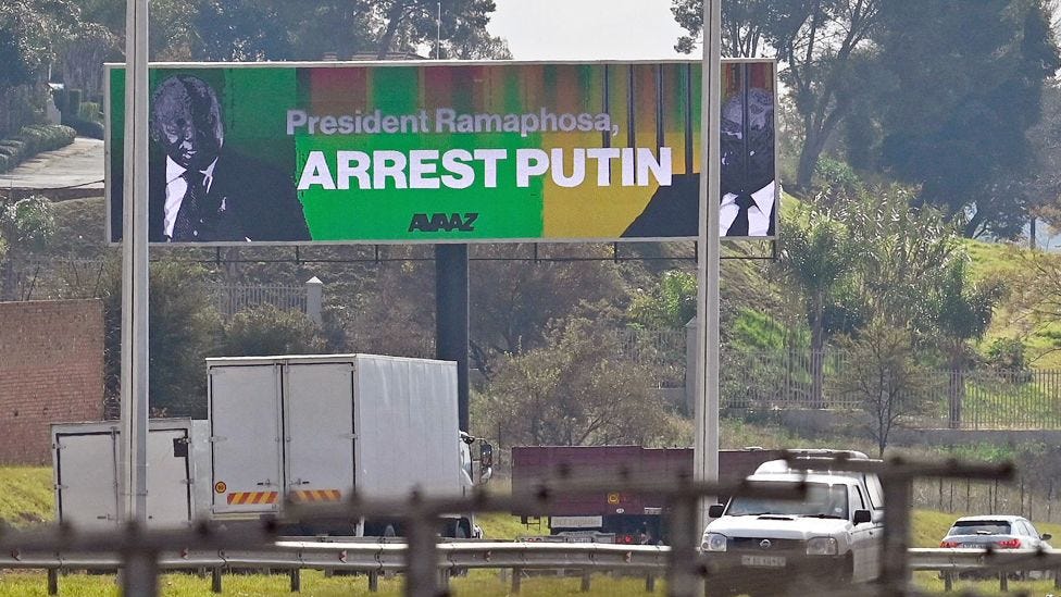 A billboard urging South Africa's president to arrest Mr Putin if he comes for the Brics summit - March 2023