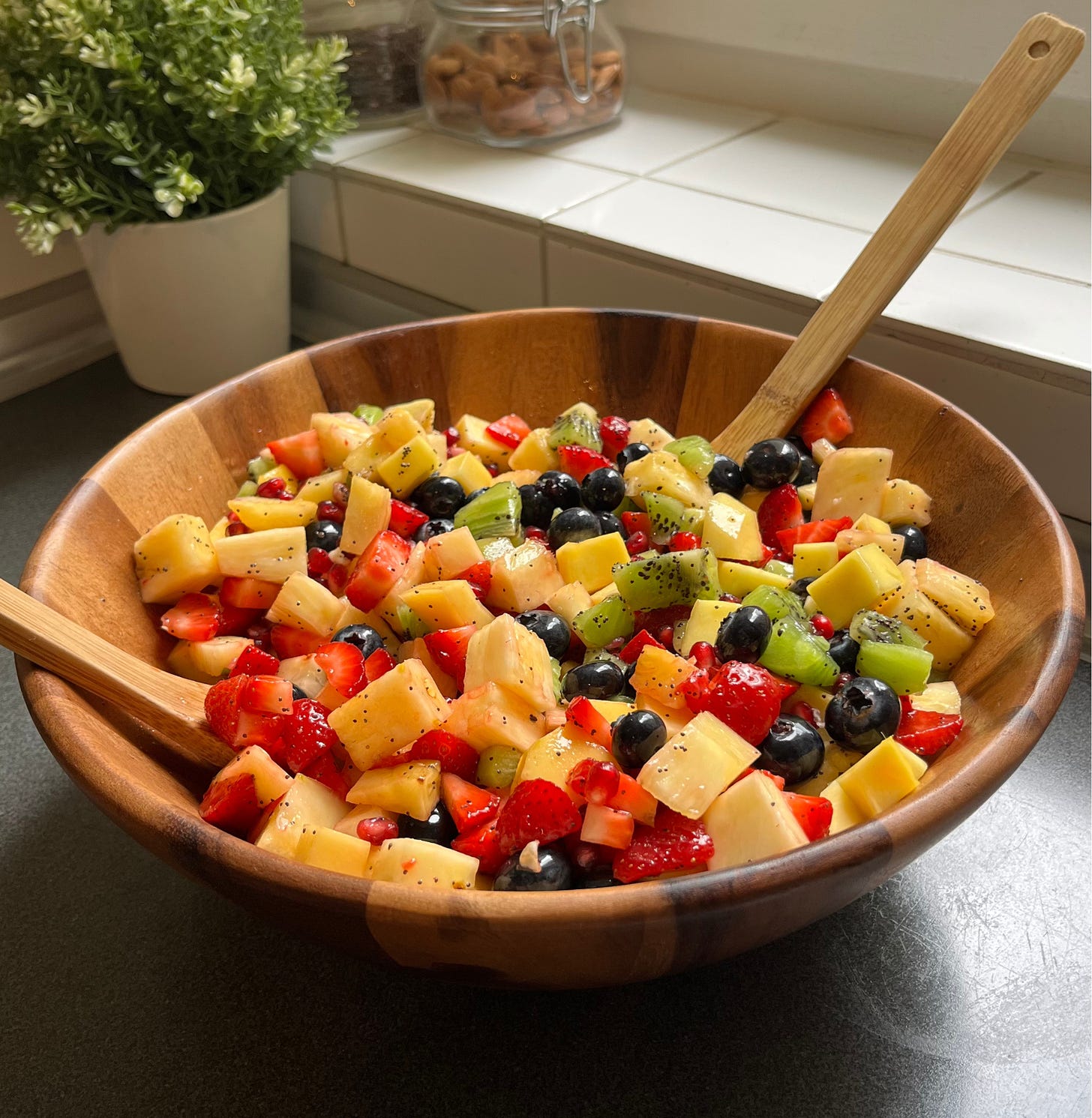 Beat the summer heat with this refreshing fruit salad! Packed with pineapple, mango, strawberries, kiwi, and more, it’s drizzled with a zesty lemon poppy seed dressing for the perfect snack or side dish.