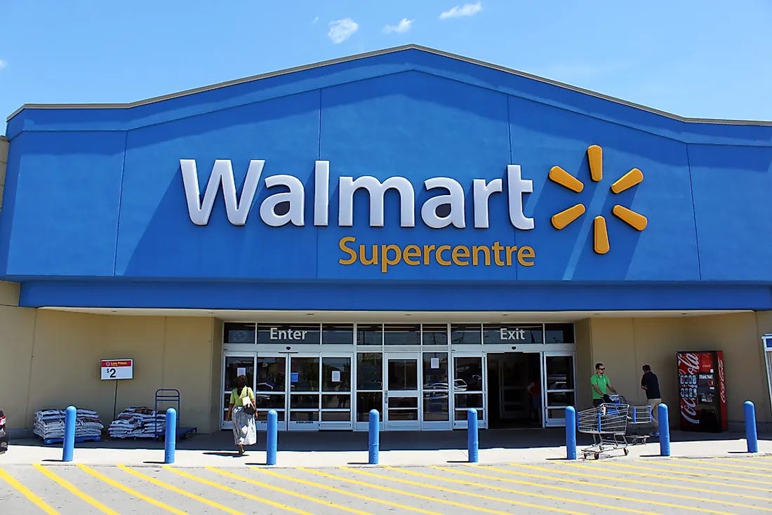 A walmart store front with a blue sign

Description automatically generated