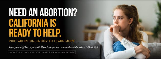 A billboard ad paid for by Newsom for Governor 2022 stating "Need an abortion? California is ready to help." which quotes Sacred Scripture and shows a woman thinking.
