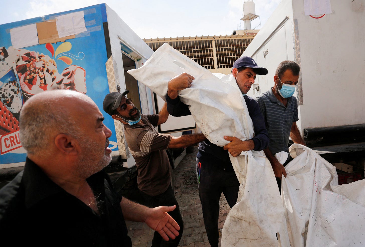 As Gaza death toll rises, bodies are stored in ice cream trucks | Reuters As Gaza death toll rises, bodies are stored in ice cream trucks | Reuters