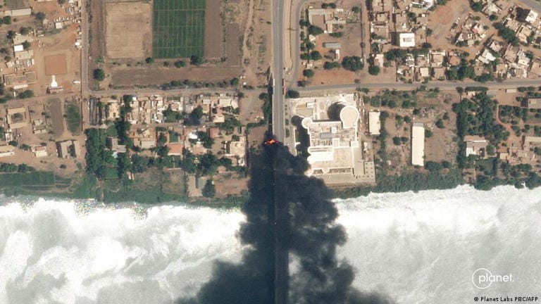 Satellite imagery shows a fire on the Kobar Bridge crossing the Blue Nile river
