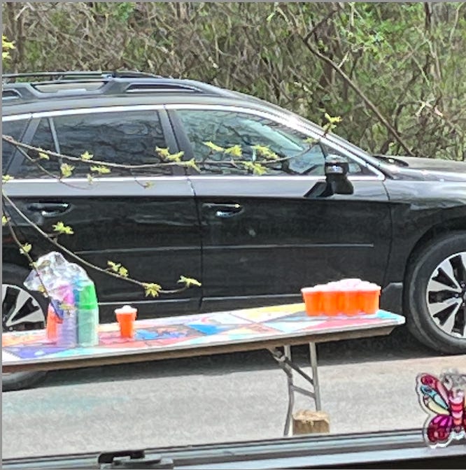 Car and a beer pong table with Solo cups