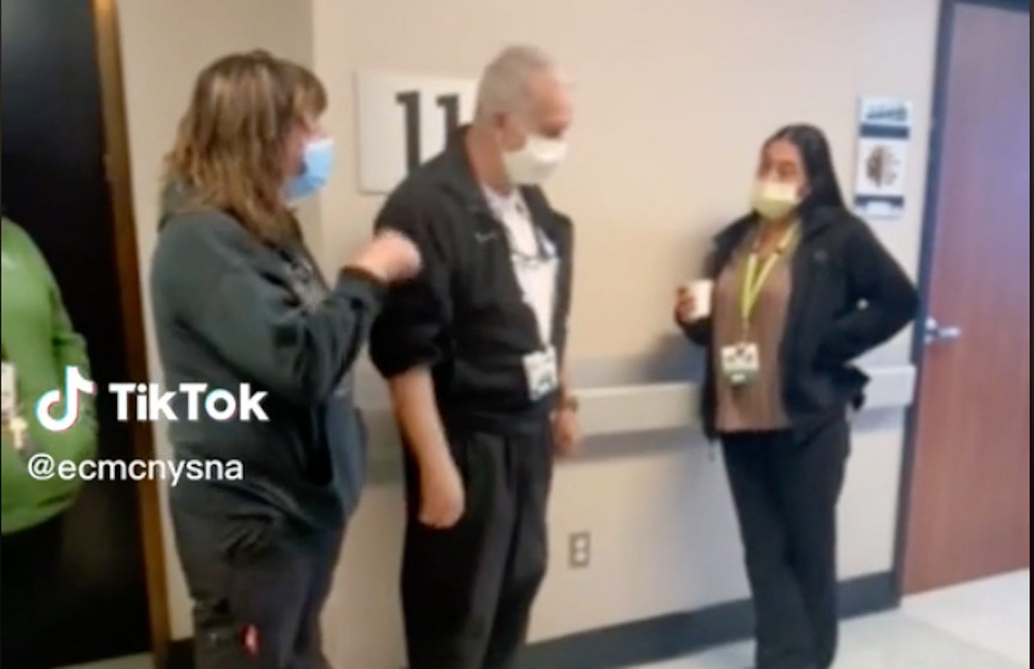 Still from @ecmcnysna TikTok video in which nurses confront hospital management over staffing ratios