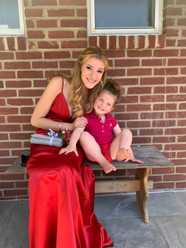 two girls in red