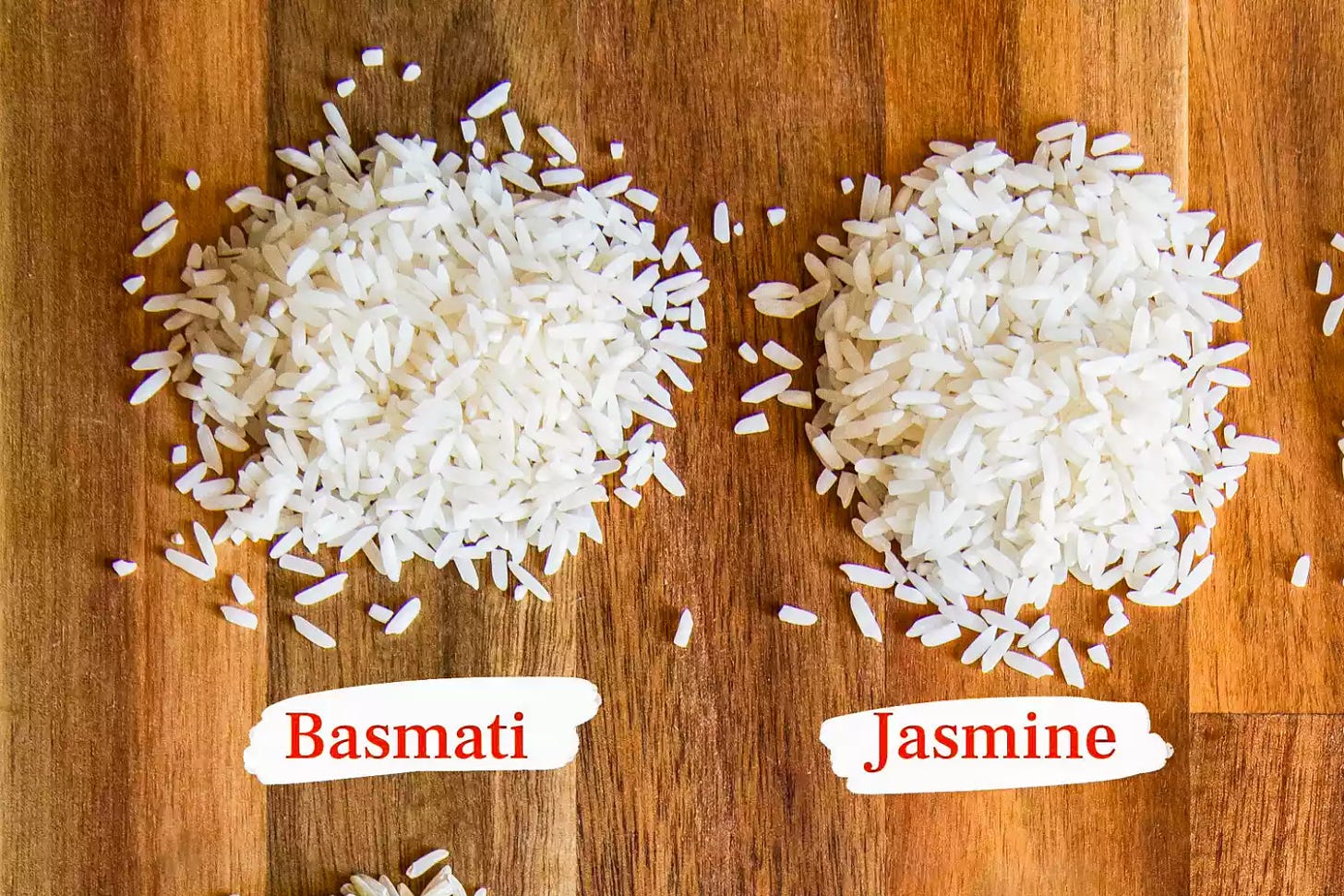 Basmati rice and Jasmine Rice on a cutting board