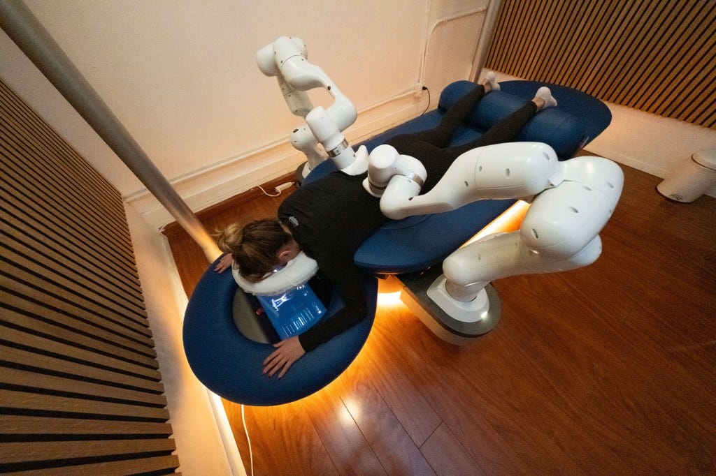 aerial view of woman getting robot massage