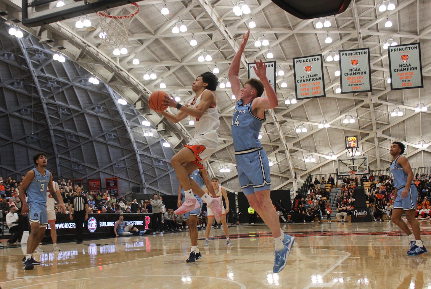 Xaivian Lee attempts a layup during Princeton’s win over Columbia on Jan. 20, 2025. (Photo by Adam Zielonka)