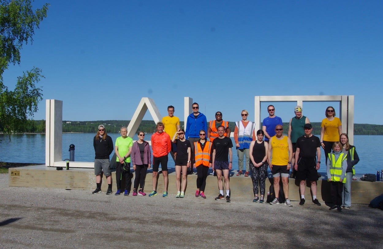 All participants on and in front of the Lahti sign