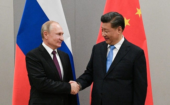 Putin In China To Meet "Dear Friend" Xi Jinping