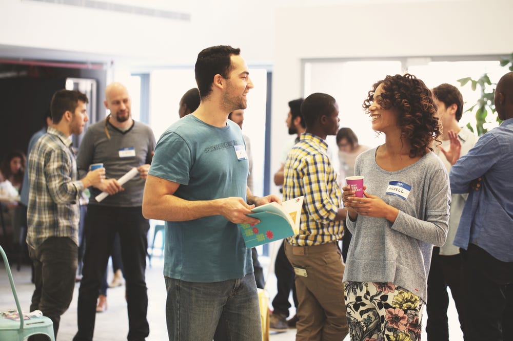 Group of people networking at a function