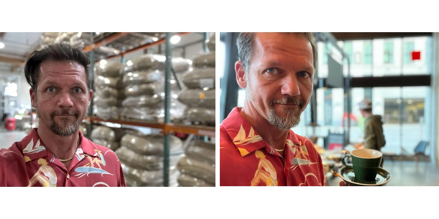 Left: a caucasian man poses (shoulders up) in front of a rack of plastic-wrapped burlap sacks filled with coffee in a warehouse. Right: The same man poses for a selfie while holding a green espresso cup up to the camera. He has a goatee and slicked back hair. he's wear a red button down with a flower print.
