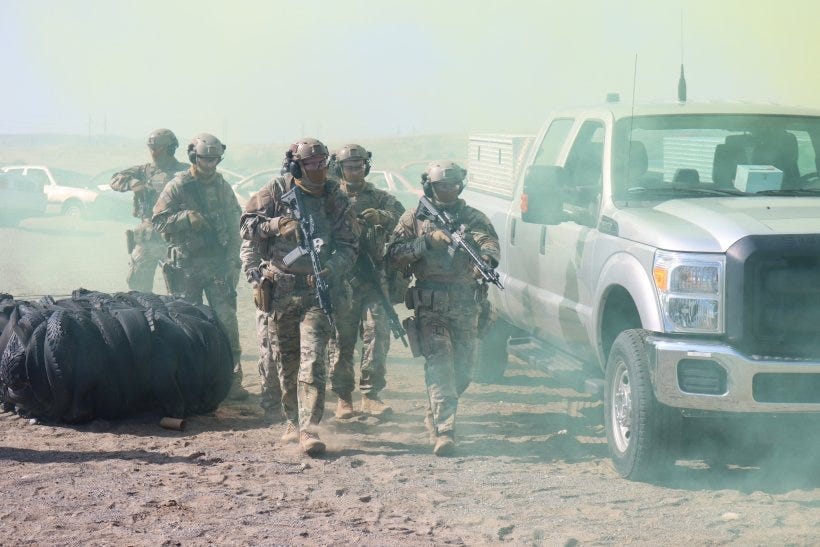 Hanford Patrol’s Special Response Team conducts vehicle assault training during the Basic Course conducted at the Patrol Training Academy on the Hanford Site. Hanford Patrol’s Special Response Team conducts vehicle assault training during the Basic Course conducted at the Patrol Training Academy on the Hanford Site.