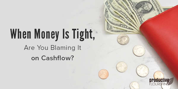 Picture of a wallet with money spilling out and the title of the post overlayed: When Money Is Tight, Are You Blaming It on Cashflow?"